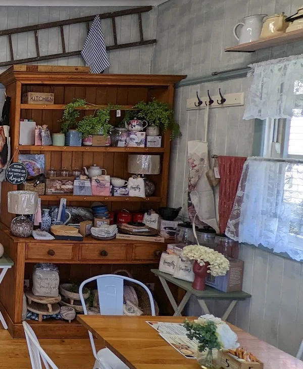 The wooden homewares cabinet filled with cups, teapots and lovely things for home